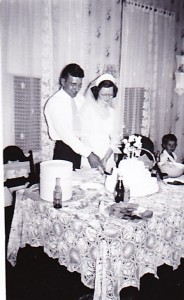 My grandparents cutting their wedding cake.
